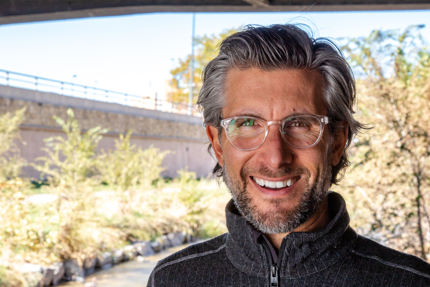 A headshot of Pete, a white man with grey hair to the top of his ears and glasses.