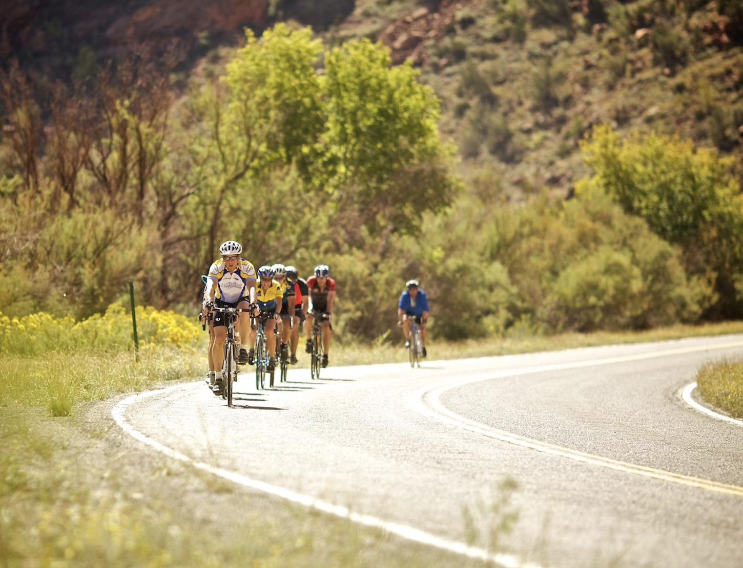 Group of cyclists rounding the bend
