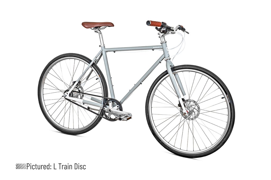 Grey commuter bicycle with disc brakes