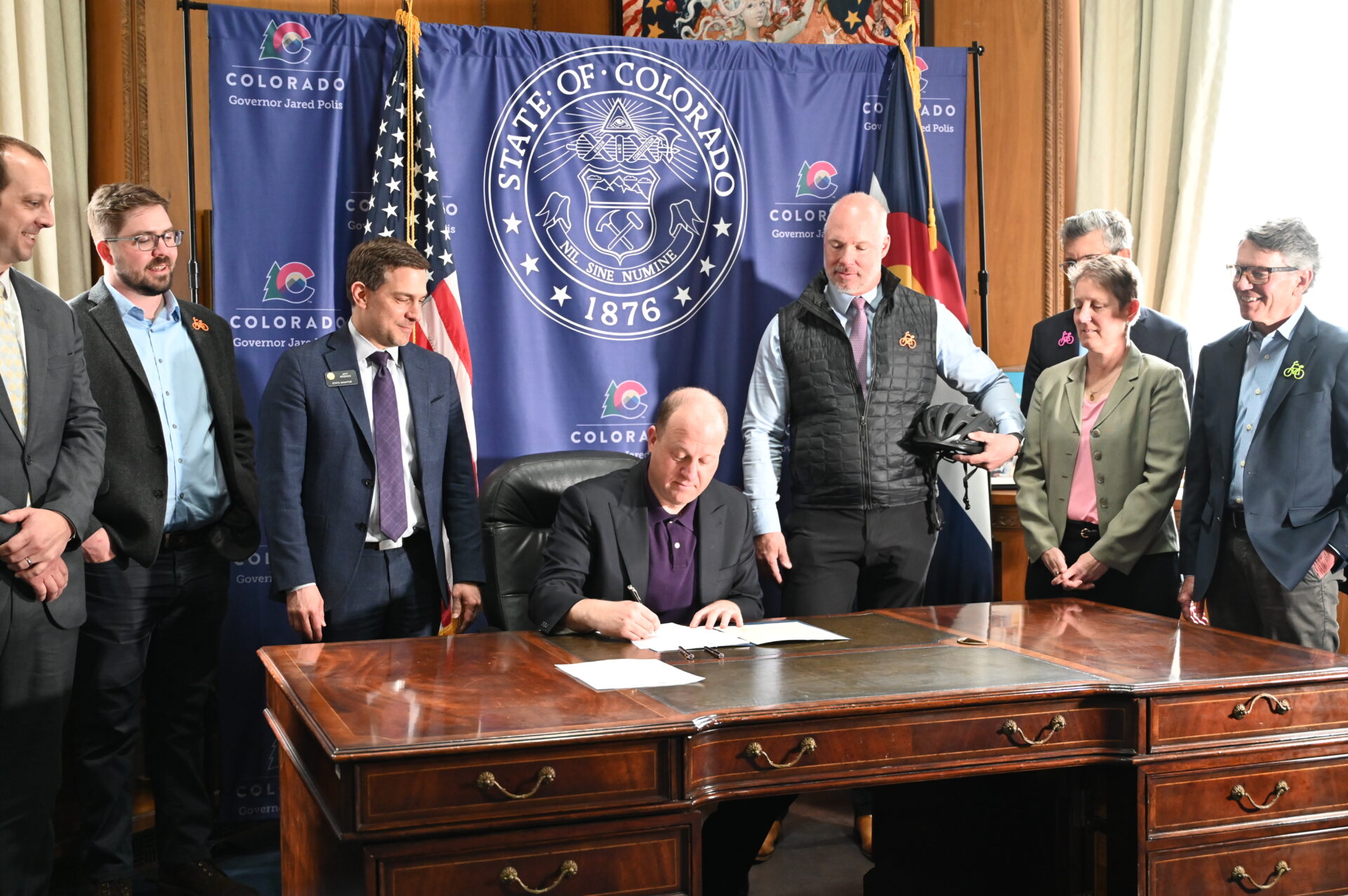 Powerline trails bill signing People watch as governor signs a bill